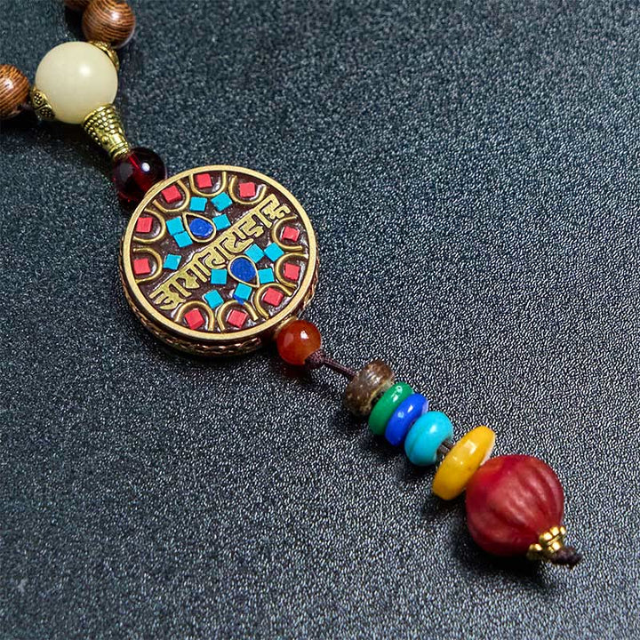 Collana con ciondolo in perline di rame, mantra luminoso, perline di rame, ciondolo in legno di Schima, fatto a mano in tibetano con Buddha Stones .