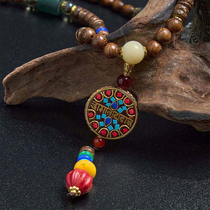 Collana con ciondolo in perline di rame, mantra luminoso, perline di rame, ciondolo in legno di Schima, fatto a mano in tibetano con Buddha Stones .