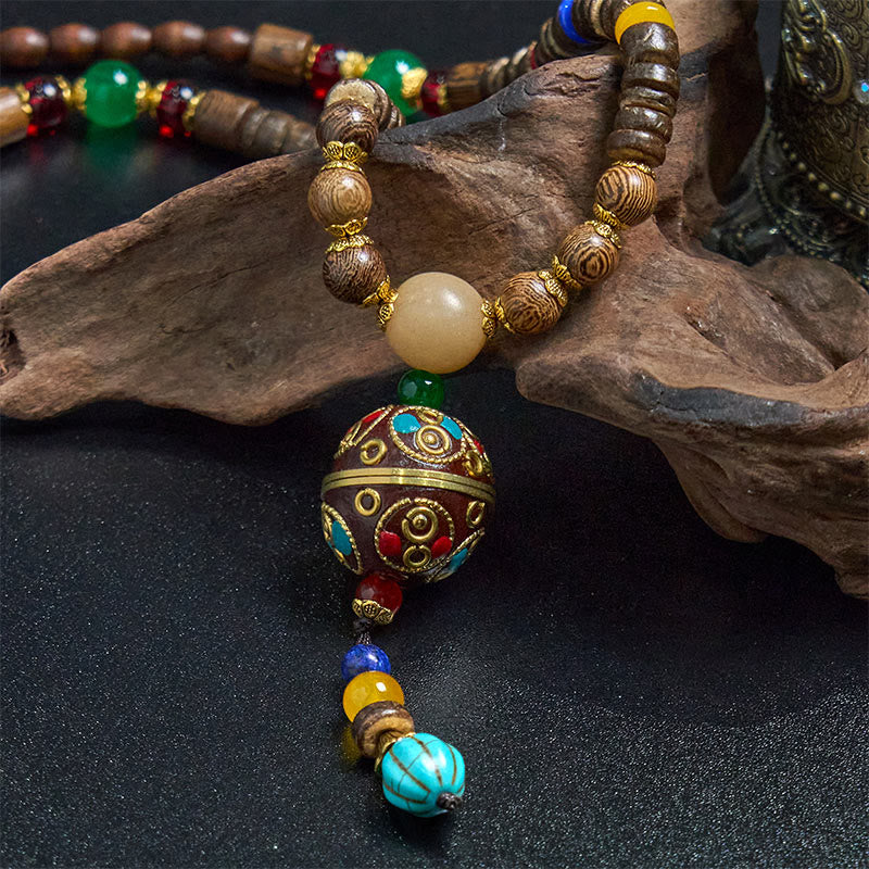 Collana con ciondolo in perline di rame, mantra luminoso, perline di rame, ciondolo in legno di Schima, fatto a mano in tibetano con Buddha Stones .