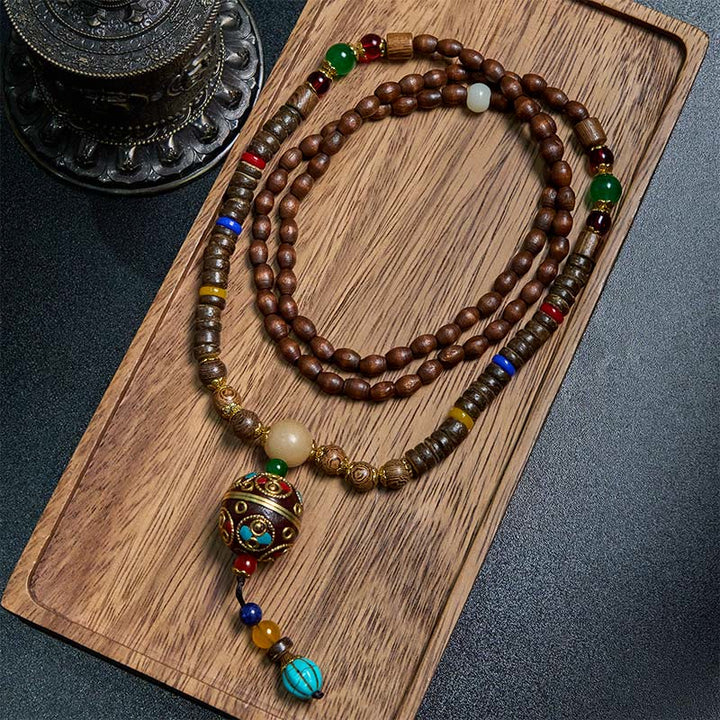 Collana con ciondolo in perline di rame, mantra luminoso, perline di rame, ciondolo in legno di Schima, fatto a mano in tibetano con Buddha Stones .