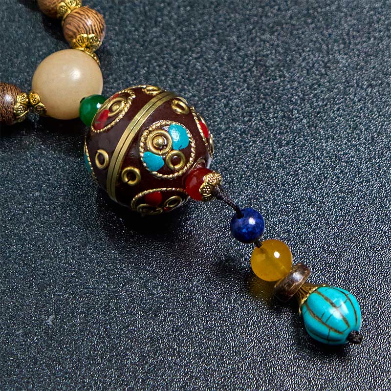 Collana con ciondolo in perline di rame, mantra luminoso, perline di rame, ciondolo in legno di Schima, fatto a mano in tibetano con Buddha Stones .