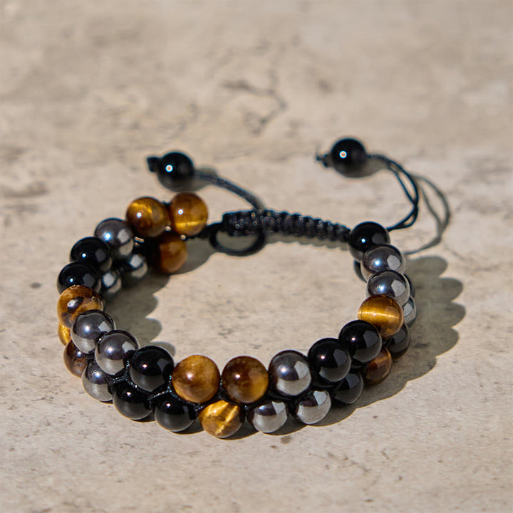 Braccialetto di protezione con perline a doppia fila in onice nero e magnetite nera con Buddha Stones in occhio di tigre naturale