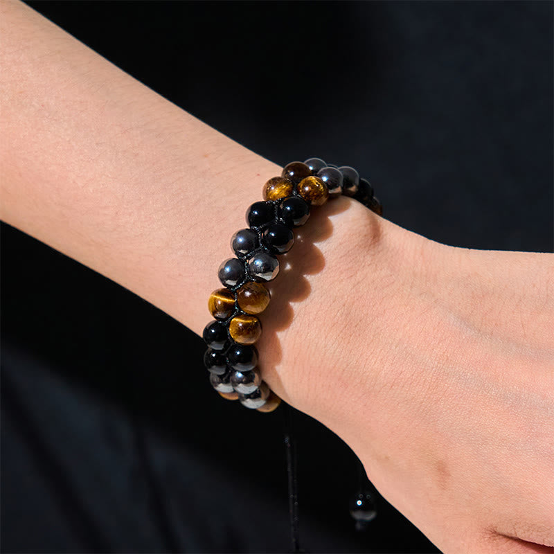 Braccialetto di protezione con perline a doppia fila in onice nero e magnetite nera con Buddha Stones in occhio di tigre naturale