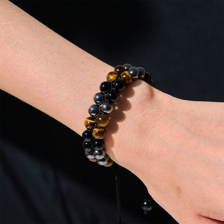 Braccialetto di protezione con perline a doppia fila in onice nero e magnetite nera con Buddha Stones in occhio di tigre naturale