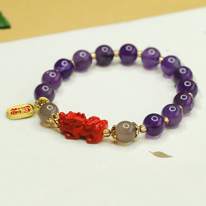 Bracciale dell'equilibrio del carattere Pi Xiu Fu Buddha Stones, ametista naturale e cinabro
