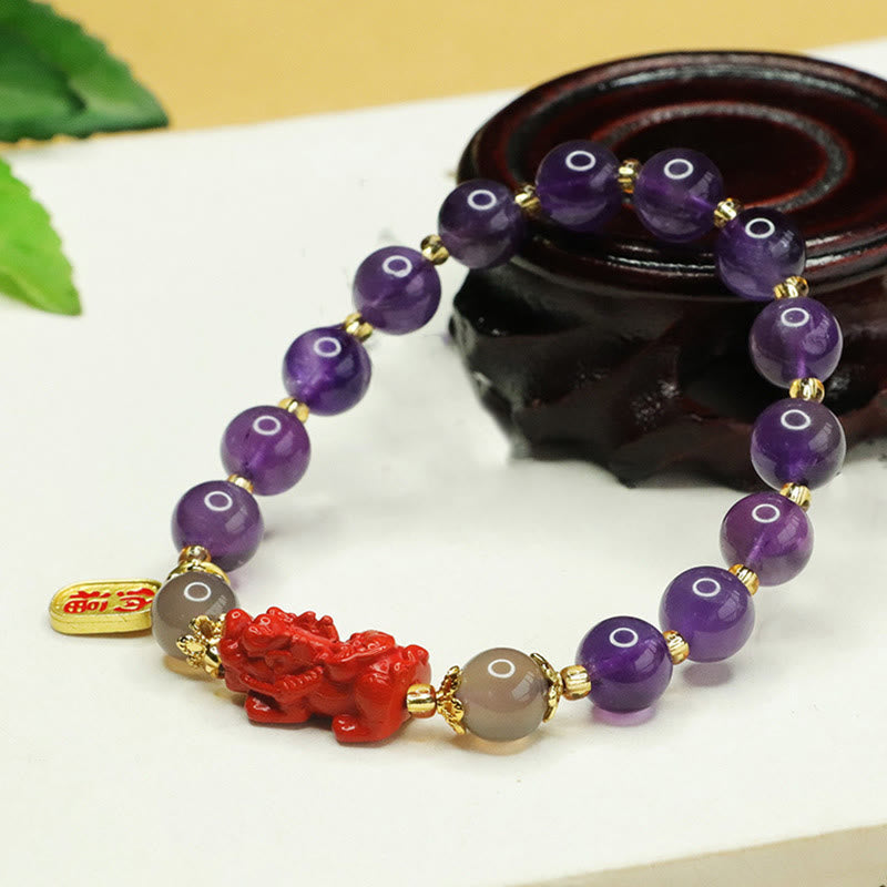Bracciale dell'equilibrio del carattere Pi Xiu Fu Buddha Stones, ametista naturale e cinabro