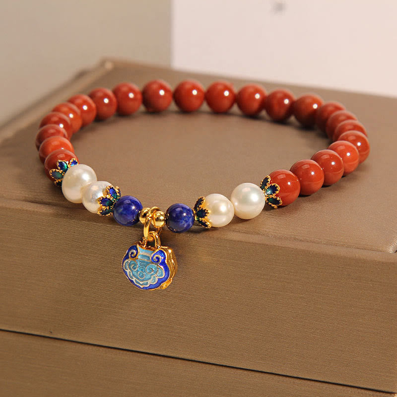 Bracciale positivo con ciondolo a forma di lucchetto della pace in agata rossa naturale del sud di Buddha Stones