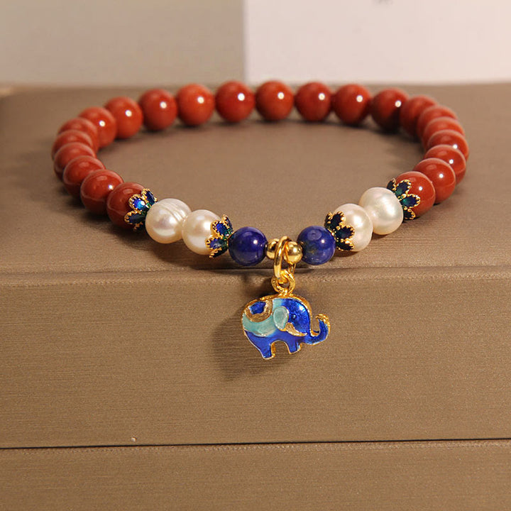 Bracciale positivo con ciondolo a forma di lucchetto della pace in agata rossa naturale del sud di Buddha Stones