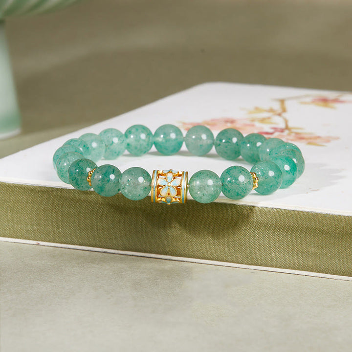 Bracciale Buddha Stones in argento sterling 925 con quarzo fragola verde e fiore calmo