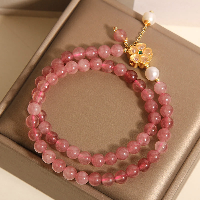 Braccialetto Buddha Stones con design positivo a doppio giro, in quarzo fragola e quadrifoglio