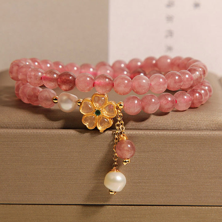 Braccialetto Buddha Stones con design positivo a doppio giro, in quarzo fragola e quadrifoglio