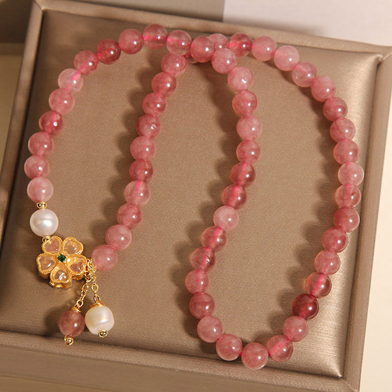 Braccialetto Buddha Stones con design positivo a doppio giro, in quarzo fragola e quadrifoglio