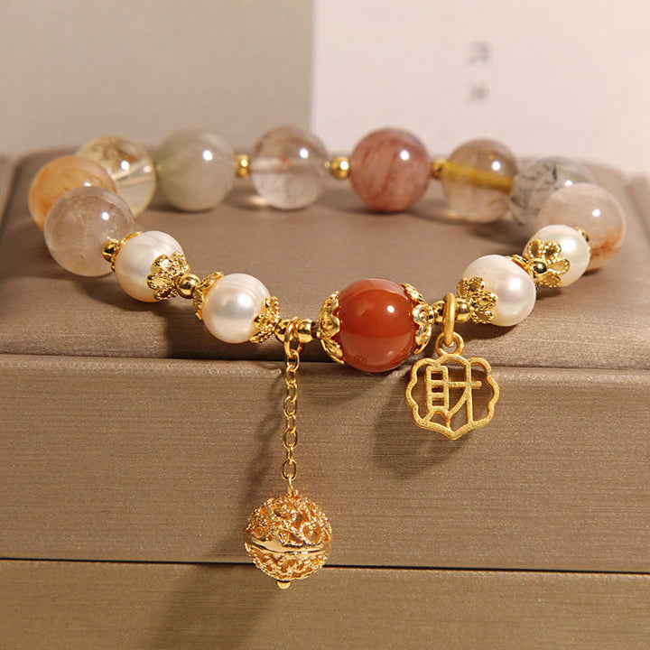 Bracciale Buddha Stones in quarzo rutilato naturale con perle che attraggono fortuna e ricchezza