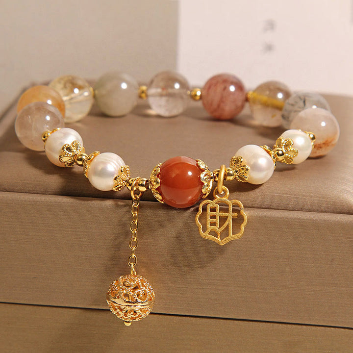 Bracciale Buddha Stones in quarzo rutilato naturale con perle che attraggono fortuna e ricchezza