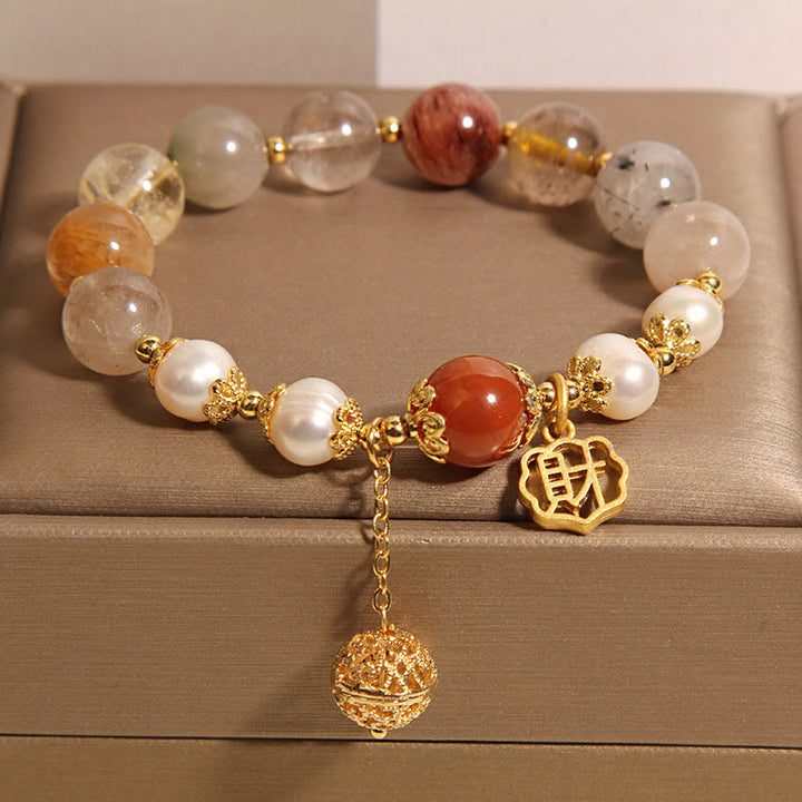 Bracciale Buddha Stones in quarzo rutilato naturale con perle che attraggono fortuna e ricchezza