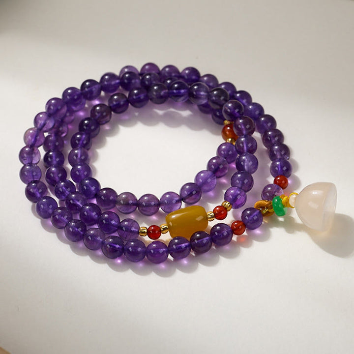 Bracciale multistrato in equilibrio di loto, con perle di ametista naturale, pendente con zucca e calcedonio, perline Buddha Stones