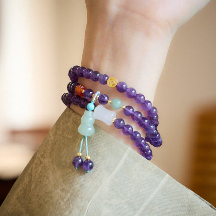 Bracciale multistrato in equilibrio di loto, con perle di ametista naturale, pendente con zucca e calcedonio, perline Buddha Stones