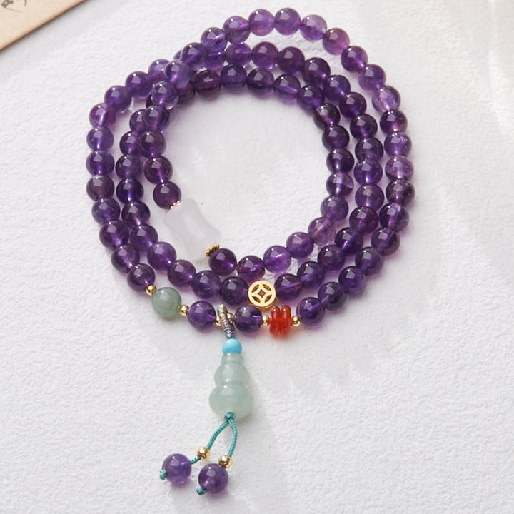 Bracciale multistrato in equilibrio di loto, con perle di ametista naturale, pendente con zucca e calcedonio, perline Buddha Stones