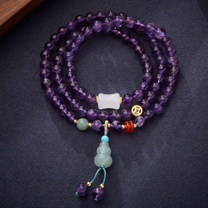 Bracciale multistrato in equilibrio di loto, con perle di ametista naturale, pendente con zucca e calcedonio, perline Buddha Stones