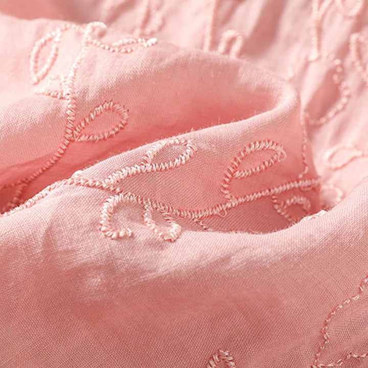 Camicia da donna in cotone a maniche corte con colletto rialzato, bottoni frontali ricamati con Buddha Stones