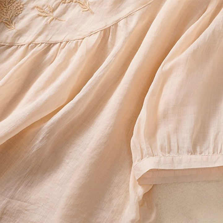 Camicia da donna in cotone e lino a maniche corte con scollo a giro e fiori ricamati con Buddha Stones