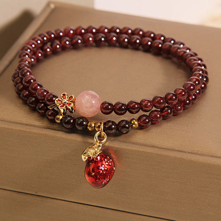 Braccialetto di protezione con campanella a forma di fiore, perline di quarzo rosa granato ultrasottili naturali da 3 mm Buddha Stones