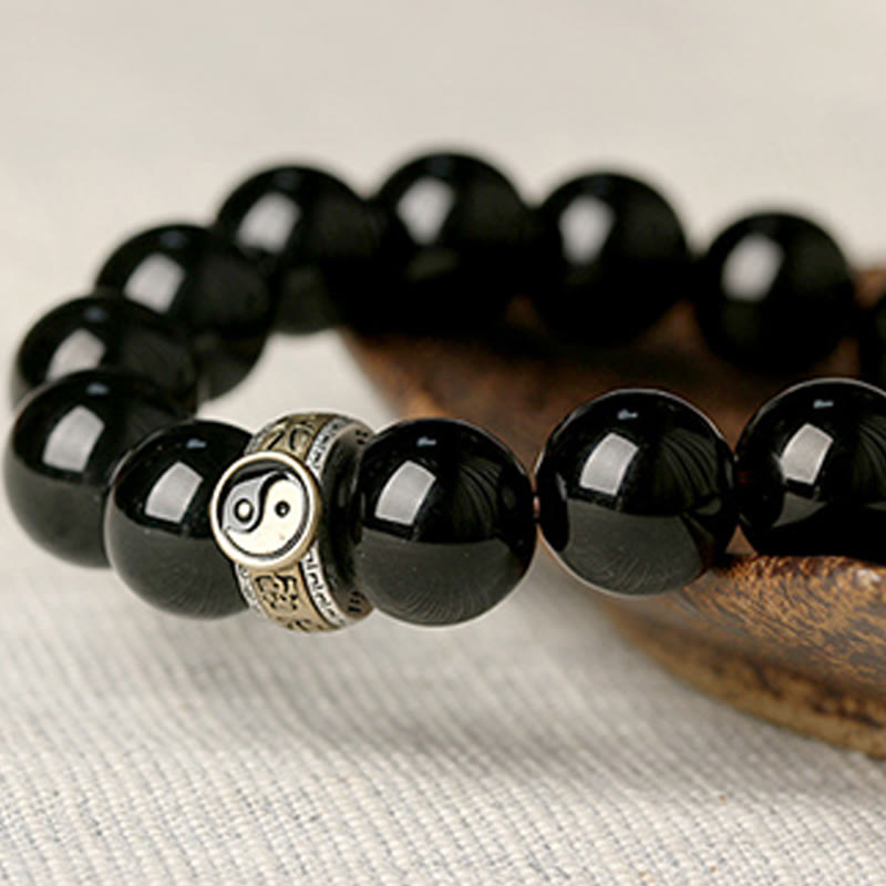 Braccialetto di adempimento del mantra dei nove caratteri Yin Yang in ossidiana nera Buddha Stones