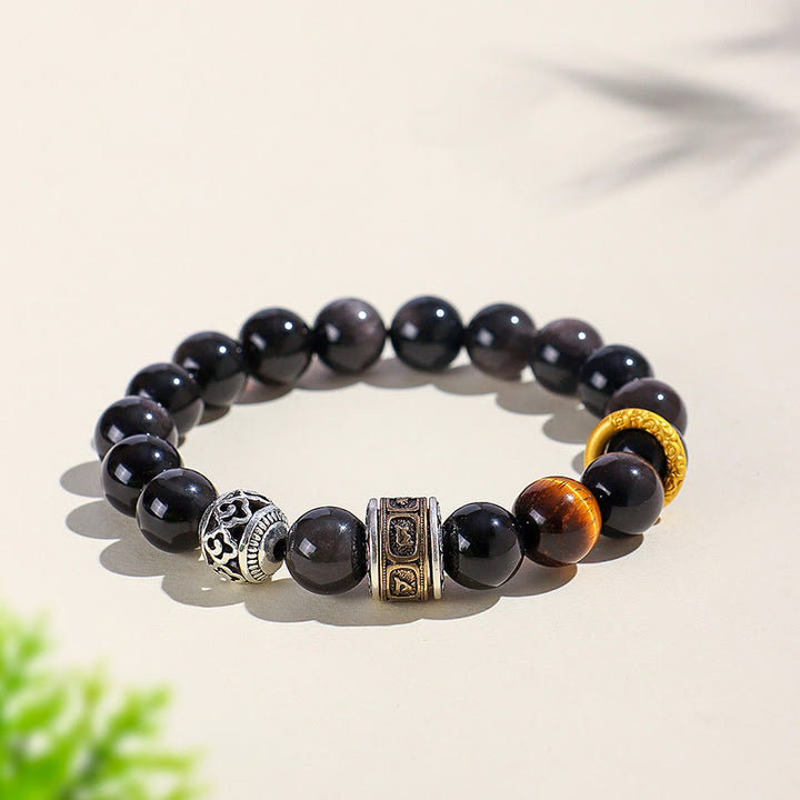 Bracciale di protezione Om Mani Padme Hum in ossidiana lucida color argento Buddha Stones