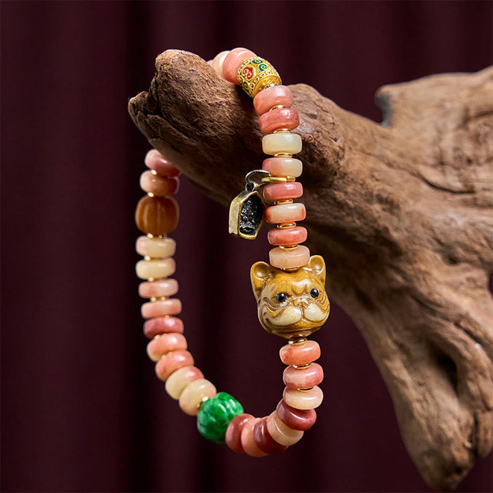 Braccialetto portafortuna Pug con perline di sangue viola in osso di cammello tibetano naturale Buddha Stones
