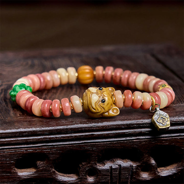 Braccialetto portafortuna Pug con perline di sangue viola in osso di cammello tibetano naturale Buddha Stones