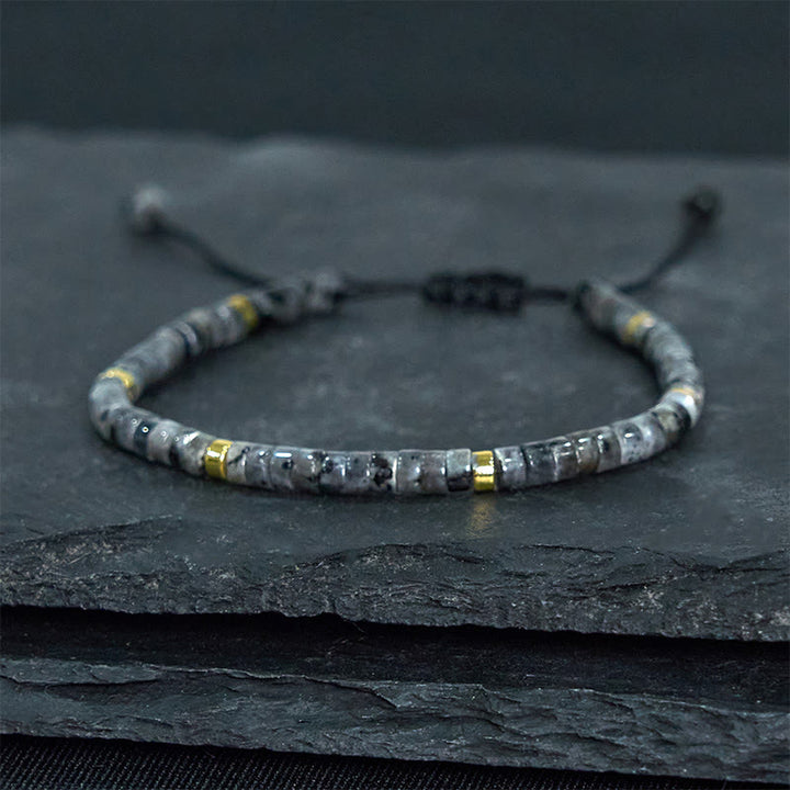 Bracciale con perline distanziatrici in pietra nera naturale con glitter Buddha Stones
