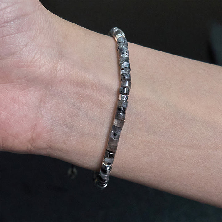 Bracciale con perline distanziatrici in pietra nera naturale con glitter Buddha Stones