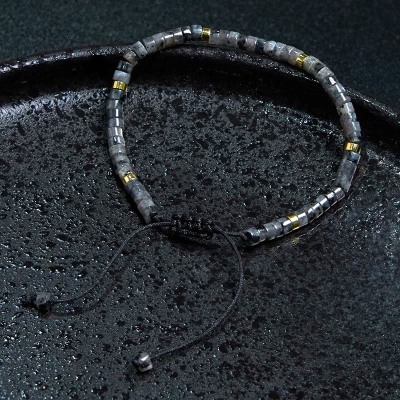 Bracciale con perline distanziatrici in pietra nera naturale con glitter Buddha Stones