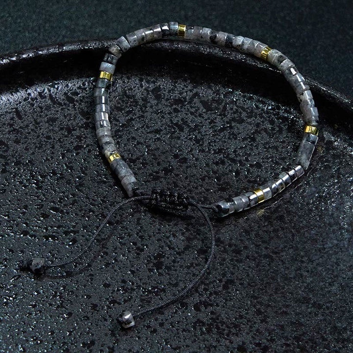 Bracciale con perline distanziatrici in pietra nera naturale con glitter Buddha Stones