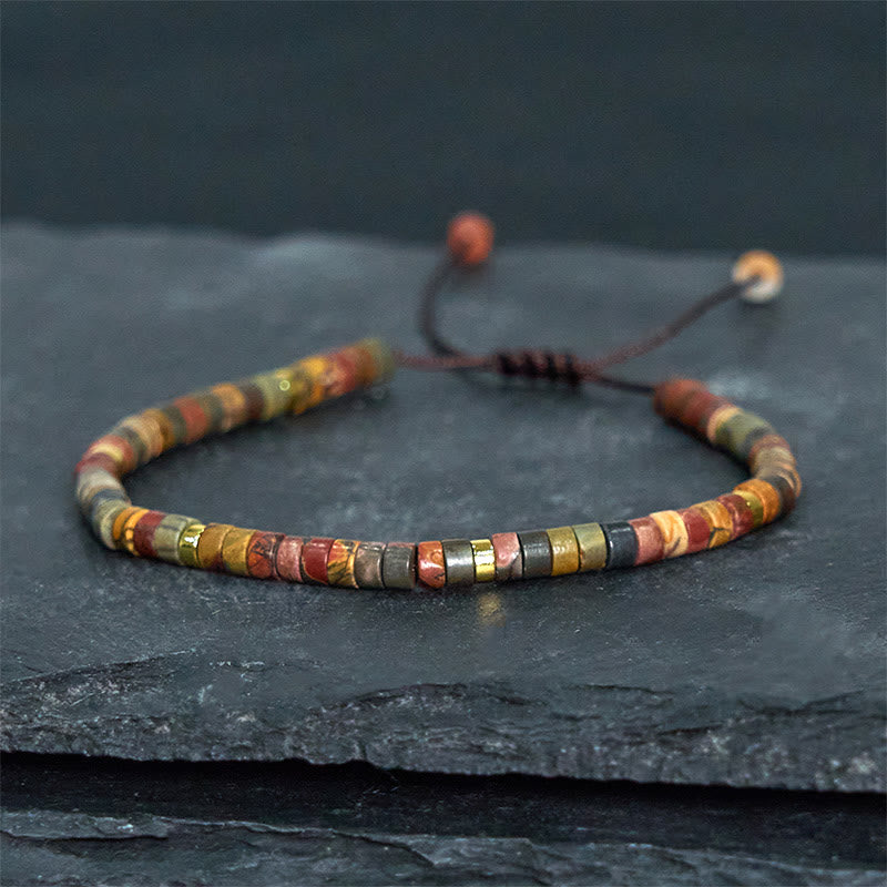 Bracciale con perline distanziatrici in rodonite e Buddha Stones per la guarigione delle relazioni
