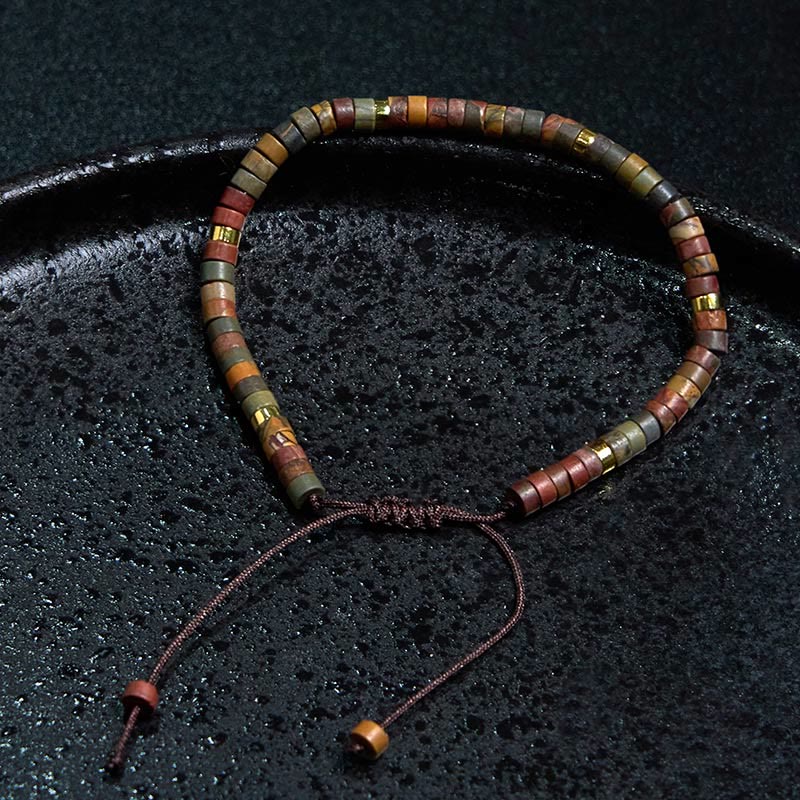 Bracciale con perline distanziatrici in rodonite e Buddha Stones per la guarigione delle relazioni