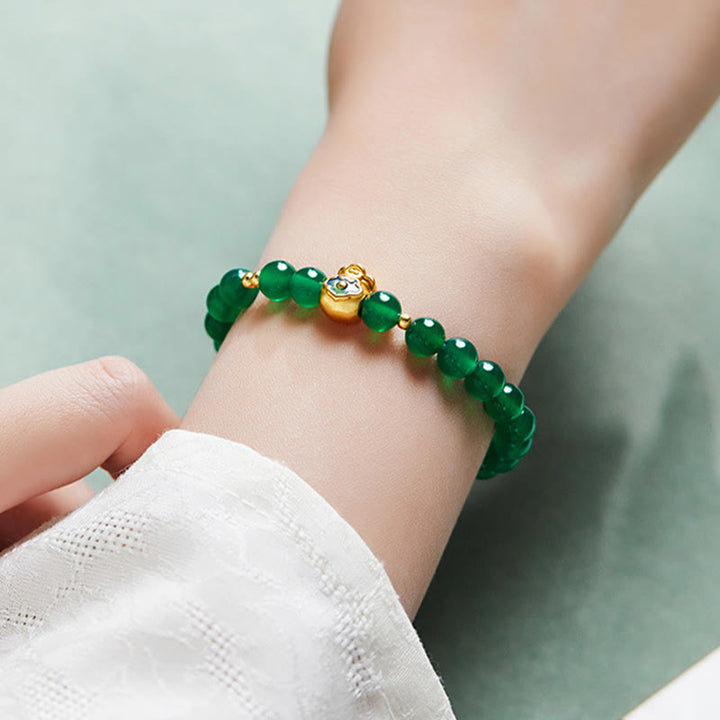 Bracciale Buddha Stones in argento sterling 999 con calcedonio verde e ciondolo portafortuna