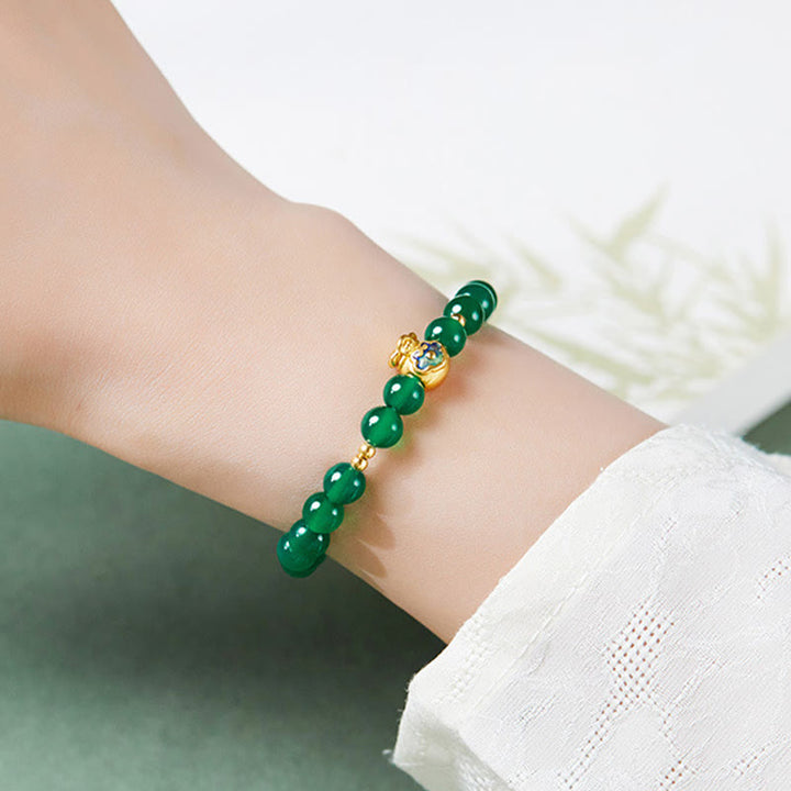 Bracciale Buddha Stones in argento sterling 999 con calcedonio verde e ciondolo portafortuna
