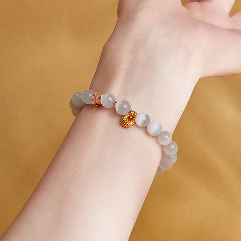 Bracciale Buddha Stones in argento sterling 925 con pietra naturale in fiore di pesco e occhio di gatto bianco positivo