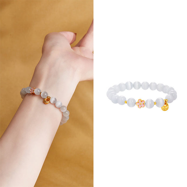 Bracciale Buddha Stones in argento sterling 925 con pietra naturale in fiore di pesco e occhio di gatto bianco positivo