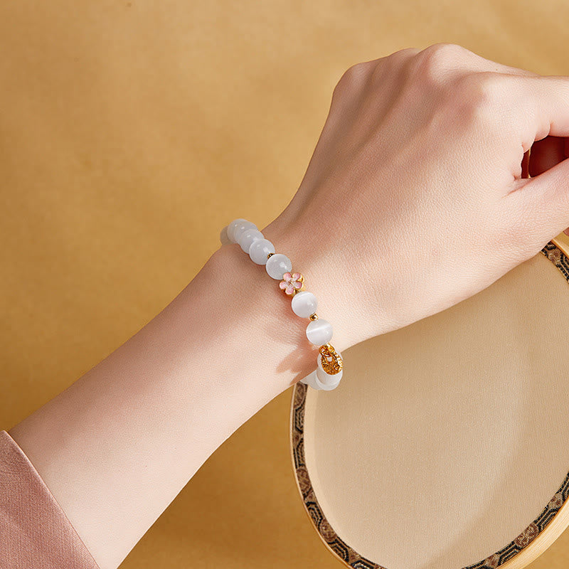 Bracciale Buddha Stones in argento sterling 925 con pietra naturale in fiore di pesco e occhio di gatto bianco positivo