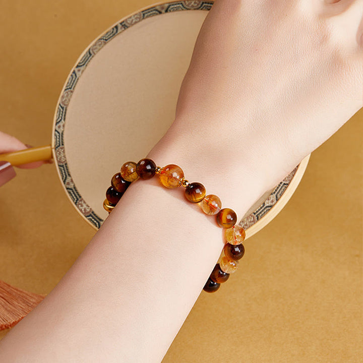 Bracciale di protezione con fibbia della pace in argento sterling 999 con citrino naturale e occhio di tigre Buddha Stones