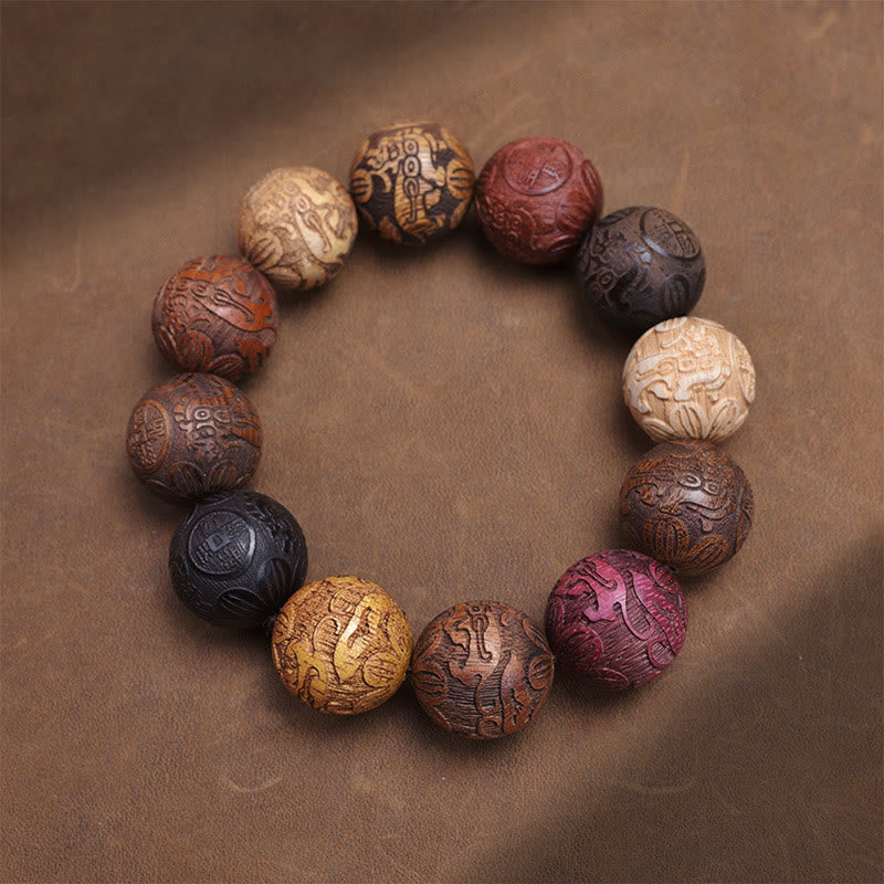 Braccialetto curativo Buddha Stones intagliate in legno di sandalo, zodiaco cinese, drago di buon auspicio, fenice, carattere Fu