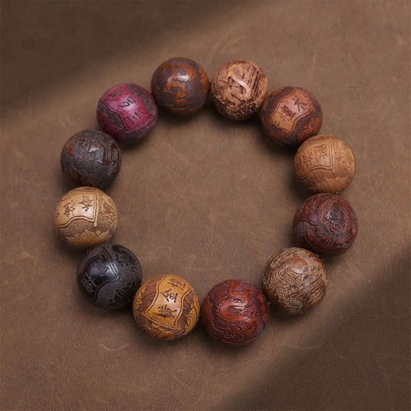 Braccialetto curativo Buddha Stones intagliate in legno di sandalo, zodiaco cinese, drago di buon auspicio, fenice, carattere Fu