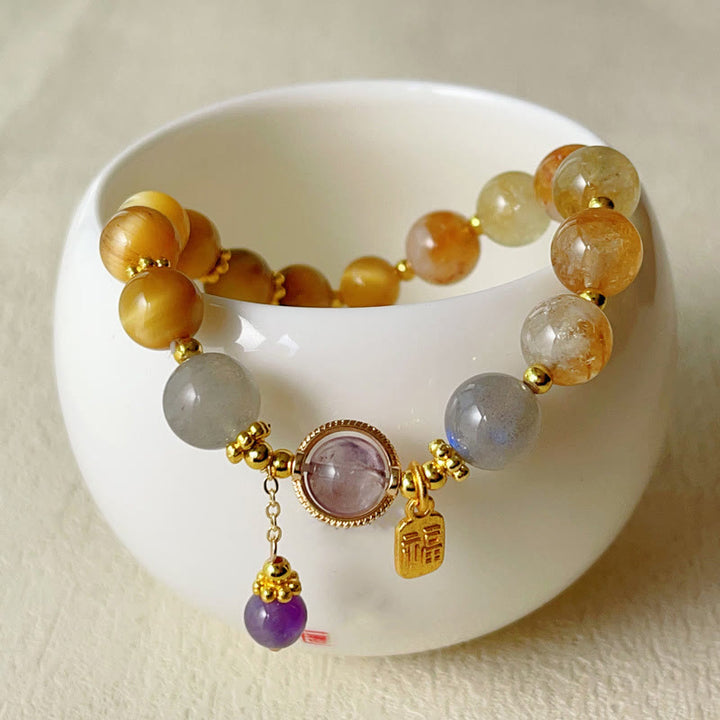 Bracciale della prosperità con carattere Fu in occhio di tigre citrino naturale Buddha Stones