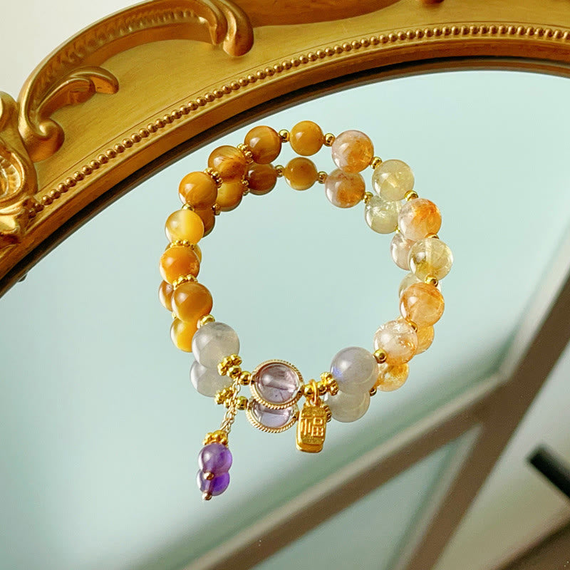 Bracciale della prosperità con carattere Fu in occhio di tigre citrino naturale Buddha Stones