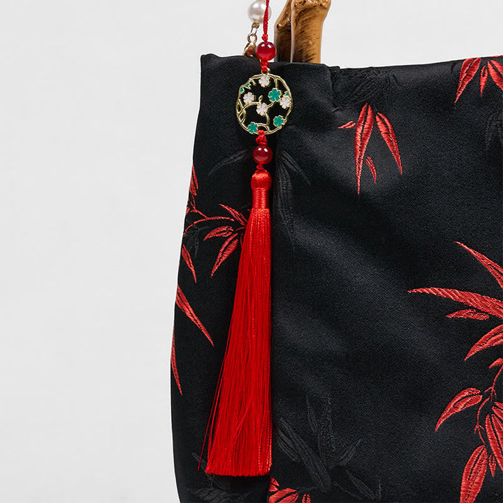 Borsa a tracolla con tracolla in perle, manico in bambù, in poliestere e cotone ricamato con Buddha Stones
