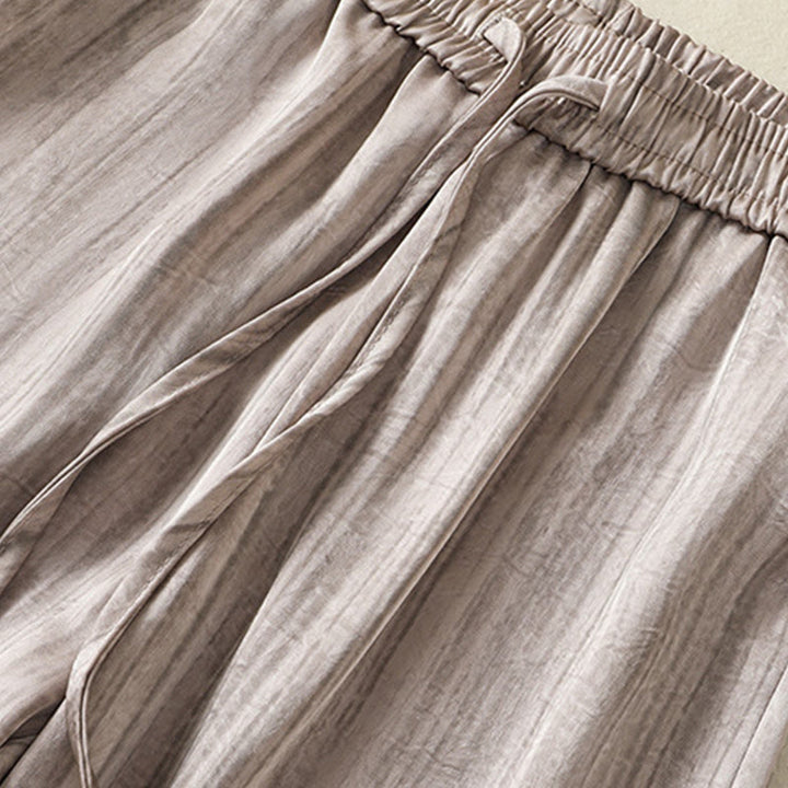 Pantaloni da donna alla caviglia con coulisse, con tasche, motivo artistico casual a linee verticali Buddha Stones