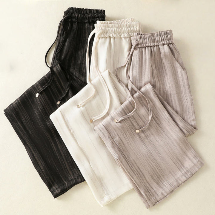 Pantaloni da donna alla caviglia con coulisse, con tasche, motivo artistico casual a linee verticali Buddha Stones