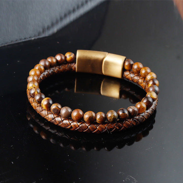 Bracciale con fibbia in acciaio al titanio e pelle con perline di pietra occhio di tigre intrecciate multistrato Buddha Stones